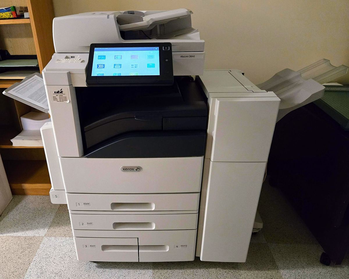 A multifunction office copier with a touchscreen control panel